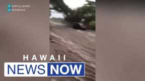Heavy rains batter Oahu, flooding roads and knocking out power to thousands