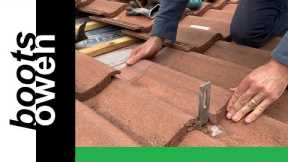 Fitting solar panel brackets to a concrete tile roof