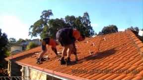Solar Power Installation On Tiled Roof