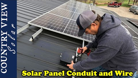 Installing Conduit and Wire to Roof Mounted Solar Panels