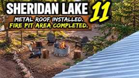 Sheridan lake 11.  Metal roof installed.  Fire pit area leveled. 